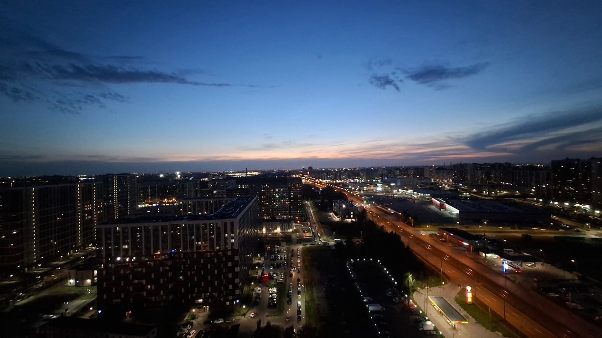 Aerial dusk views over Saint Petersburg, down to rooftop detail