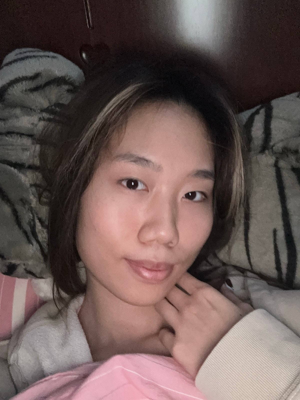 Woman photographed resting in bed in Shapingba District