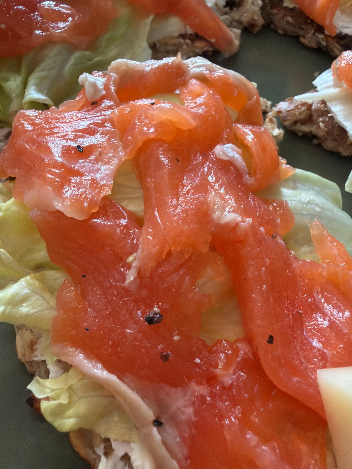 Woman prepares salmon breakfast in Saint Petersburg morning