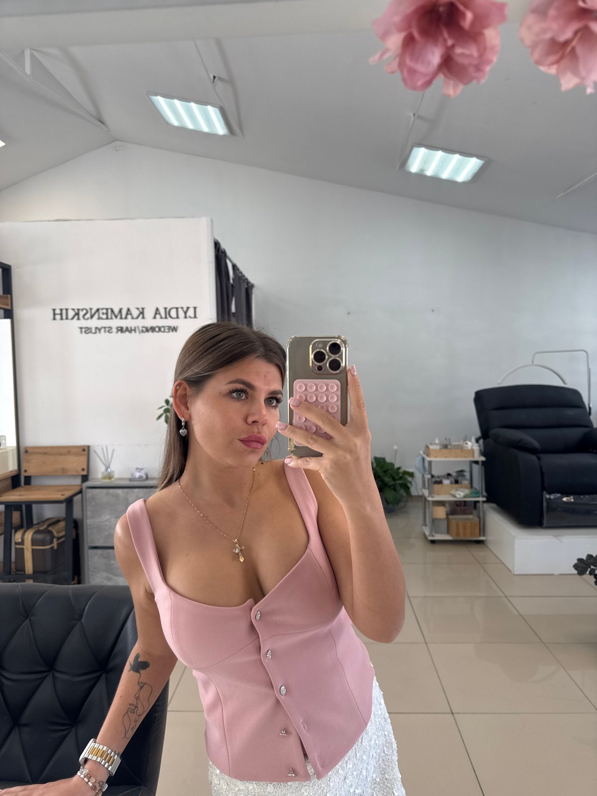 Mirror selfies at a Chaikovsky beauty salon, sequined skirt in frame