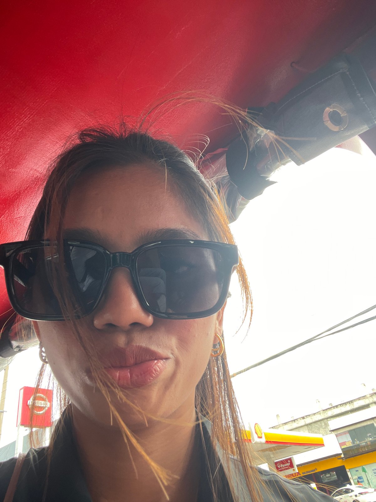 Riding through Davao City traffic, tricycle view