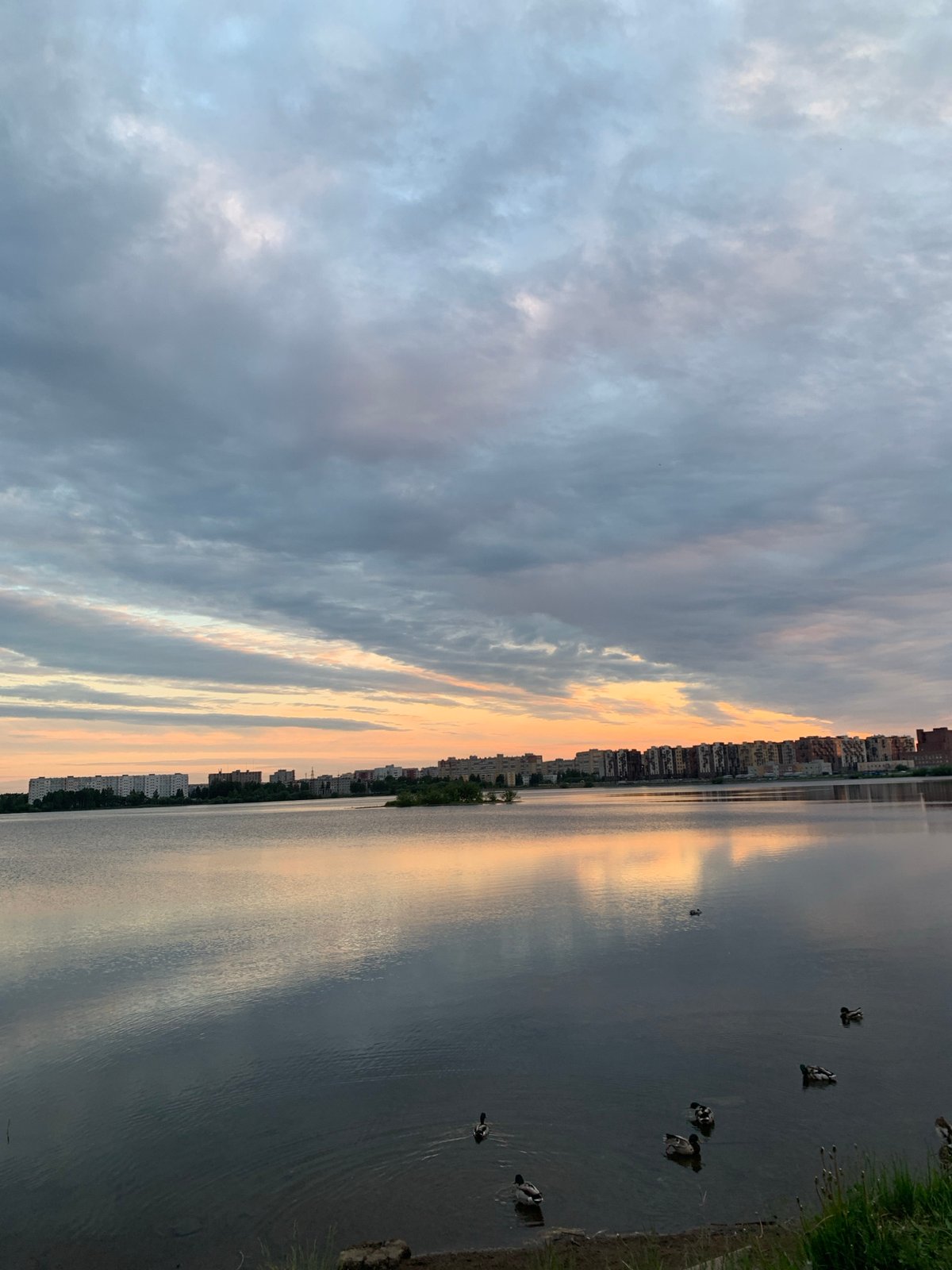 Sunset view captured over water in Severodvinsk, Russia