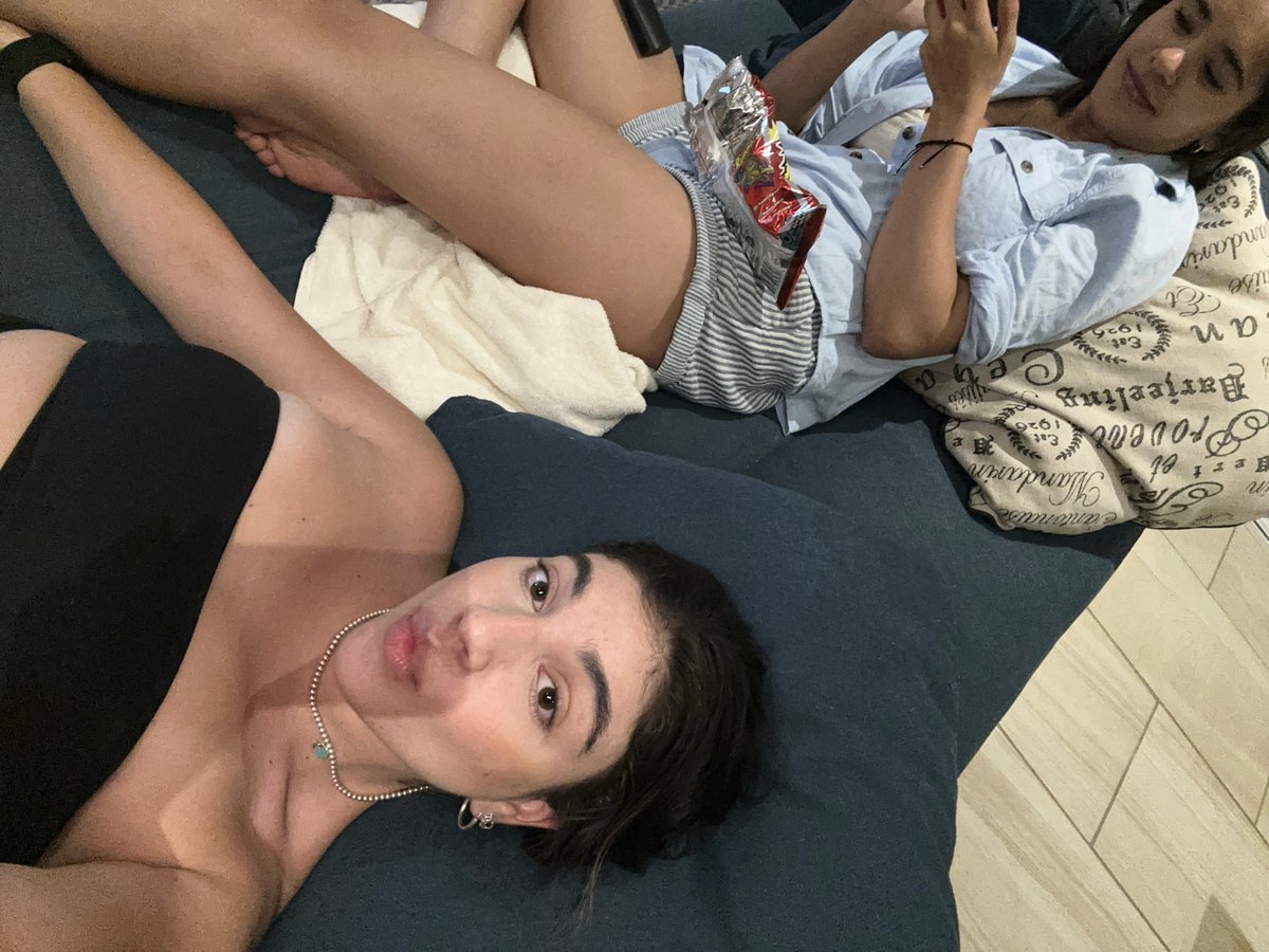 Woman takes late-night selfies on sofa in Acapulco