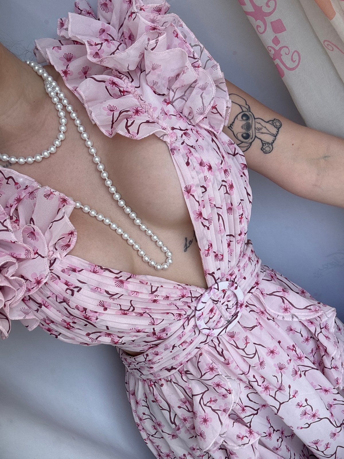 Pink floral dress styled two ways in a Terebonizh'e studio