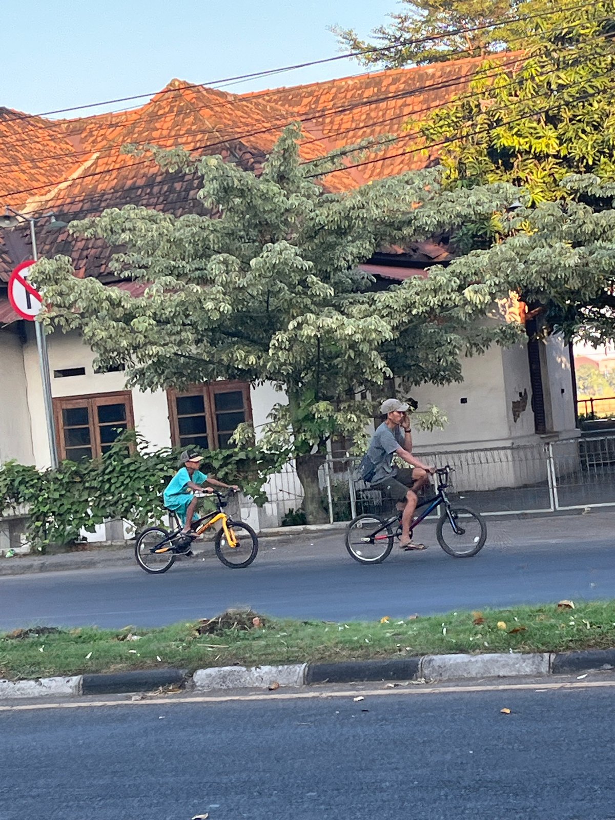Afternoon street traffic flows through Kludan, East Java