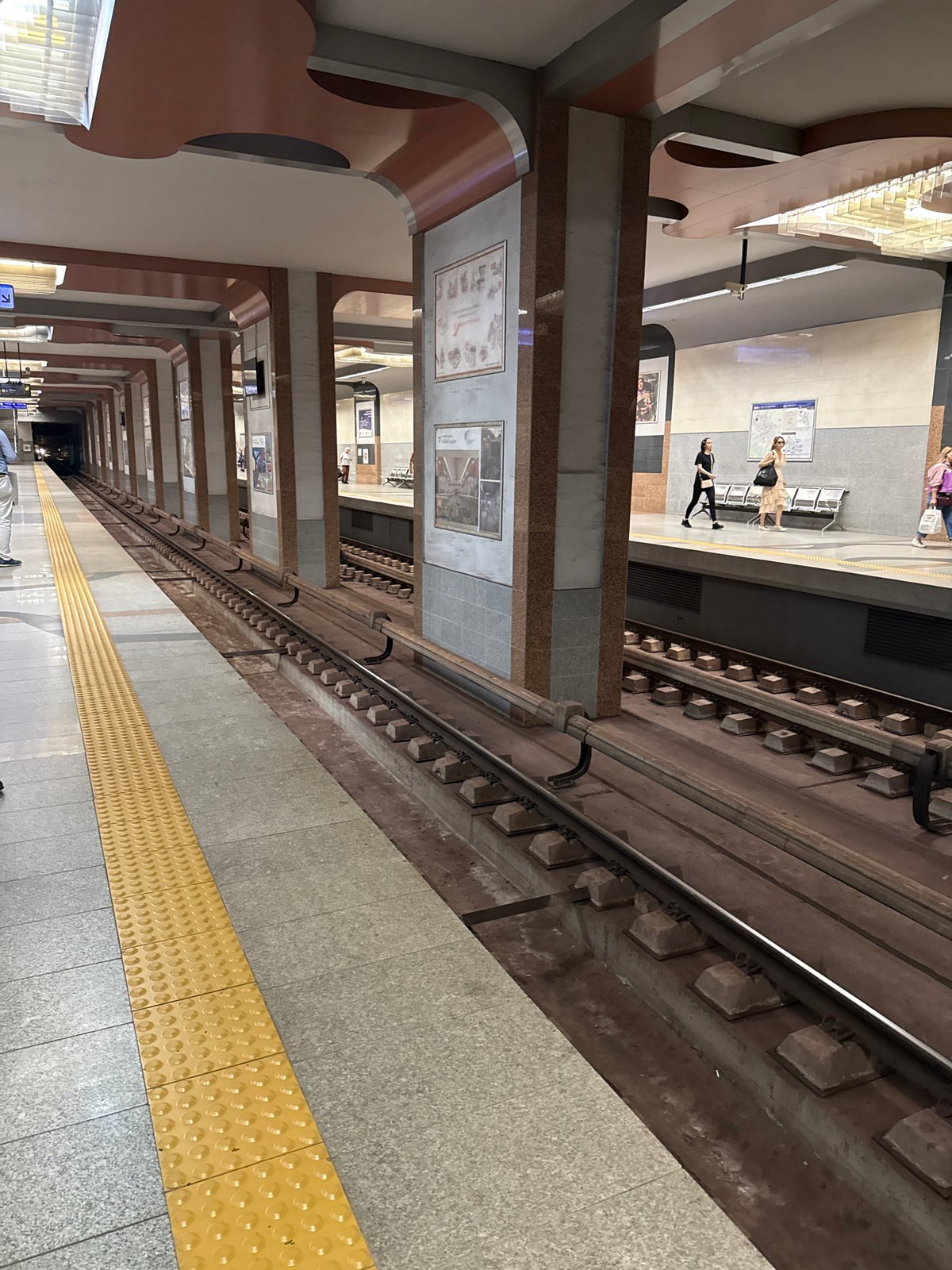 Passengers wait at Sofia metro station platform