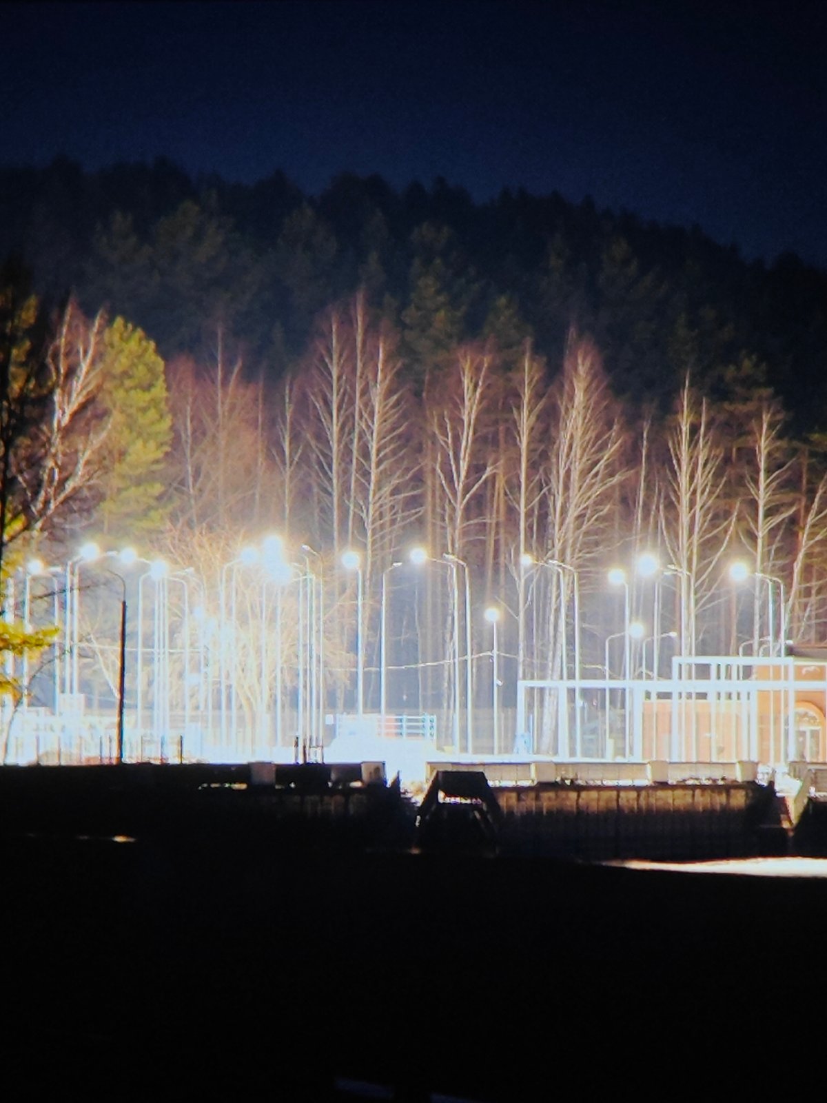 Nighttime scenes documented across Chaikovsky, Russia under full moon