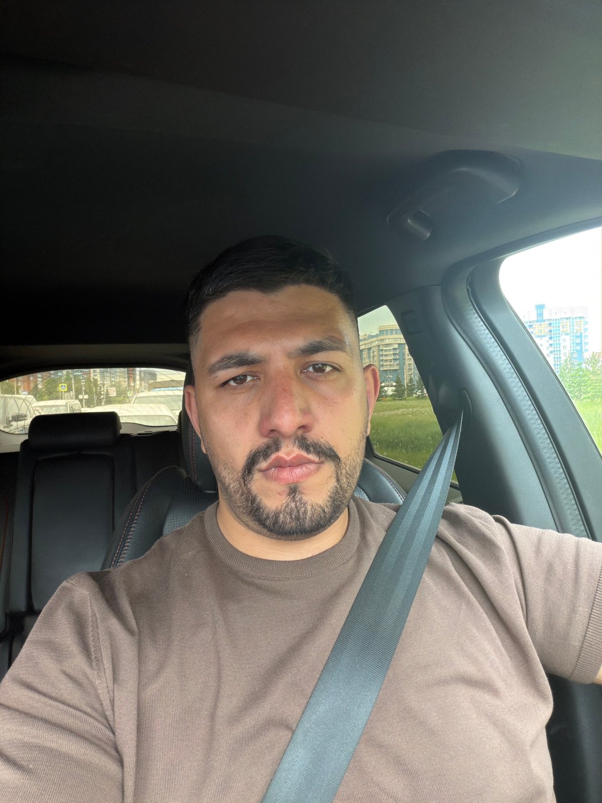 Driver captured in traffic during morning commute in Krasnoyarsk