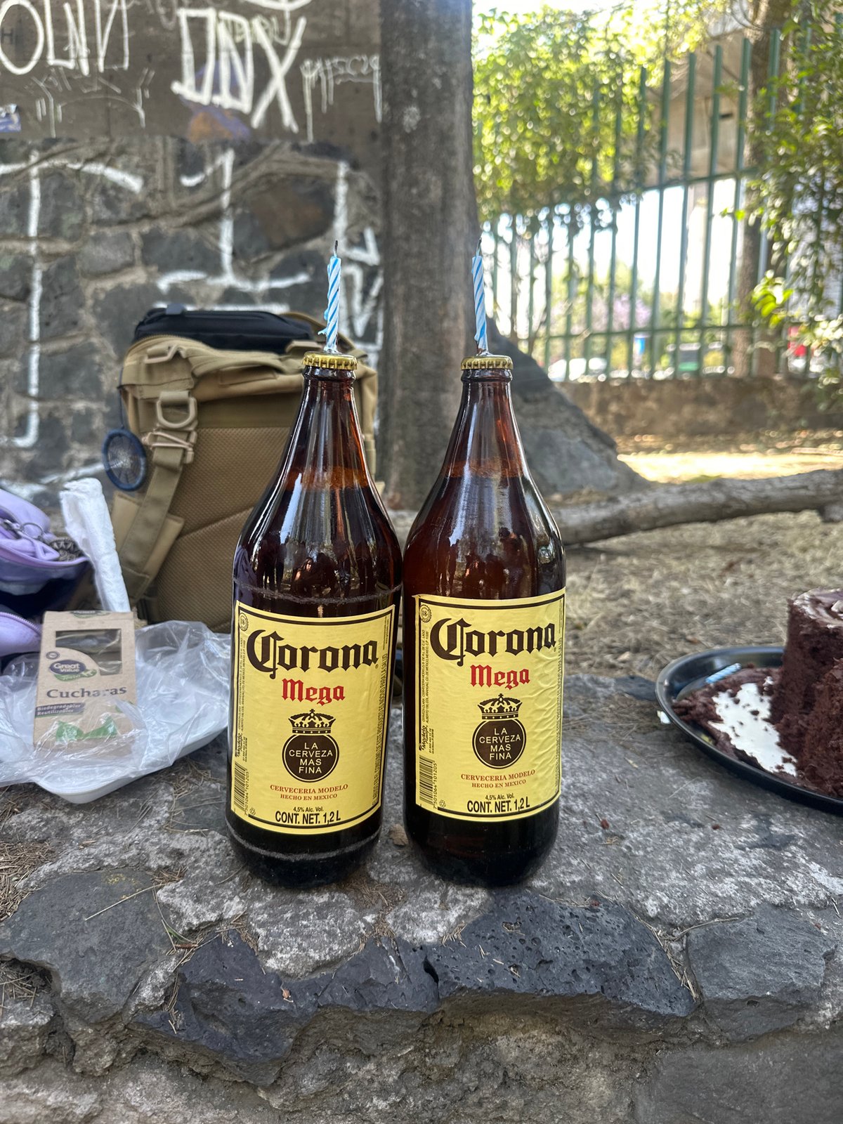 Birthday celebration features Corona beer bottles with candles in Mexico City