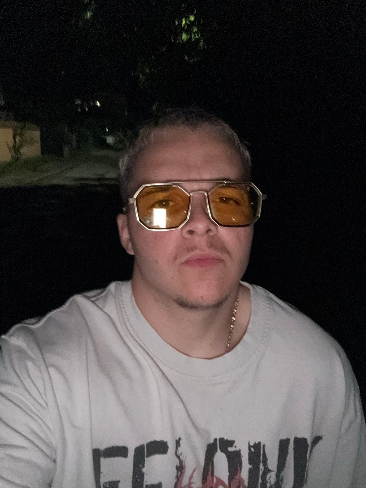 Young man documents nighttime selfie session in Kostinbrod