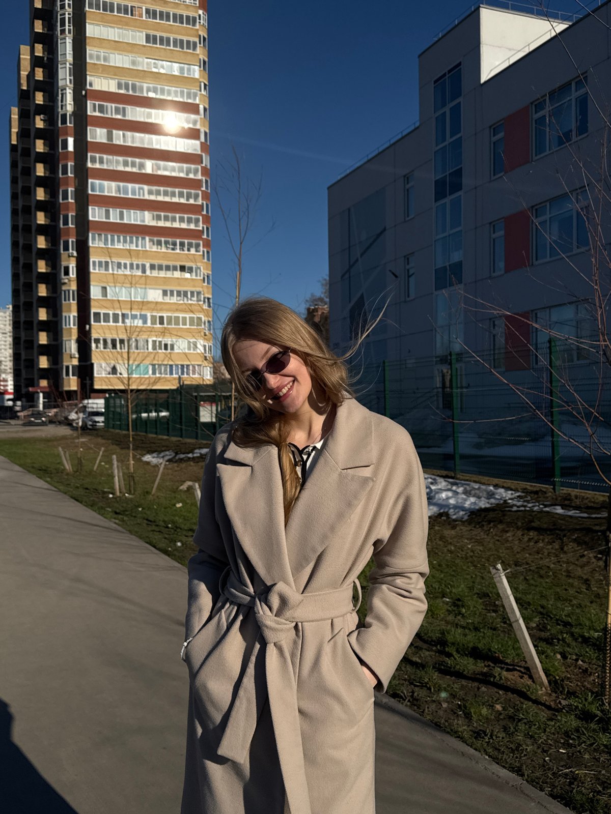 Woman and dog photographed on Perm sidewalk
