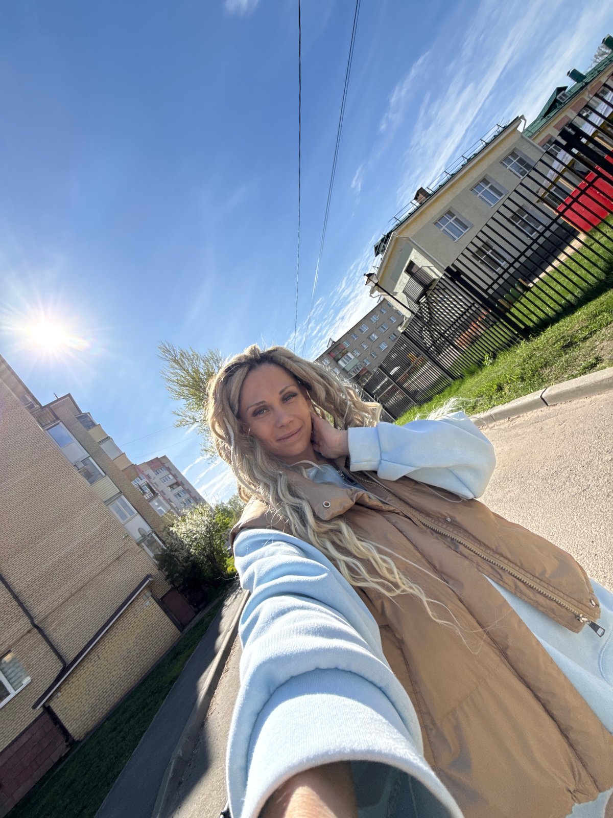 Woman and child take morning selfies in Заволжье