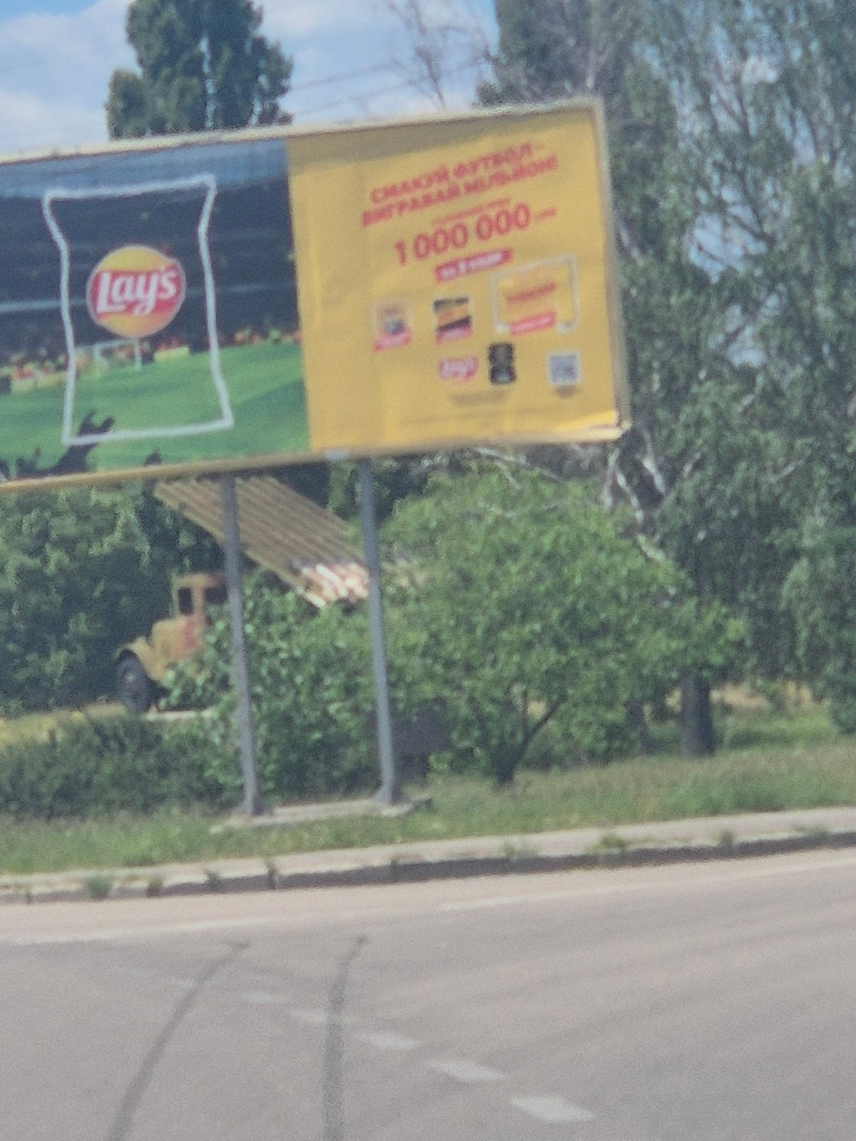 Street-level drive through Kropyvnytskyi on a June morning