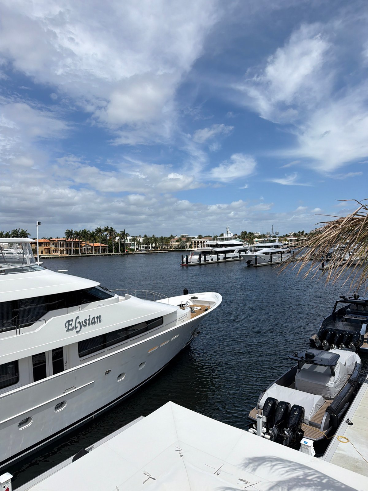 Yachts including vessel 'Elysian' documented docked in waterway