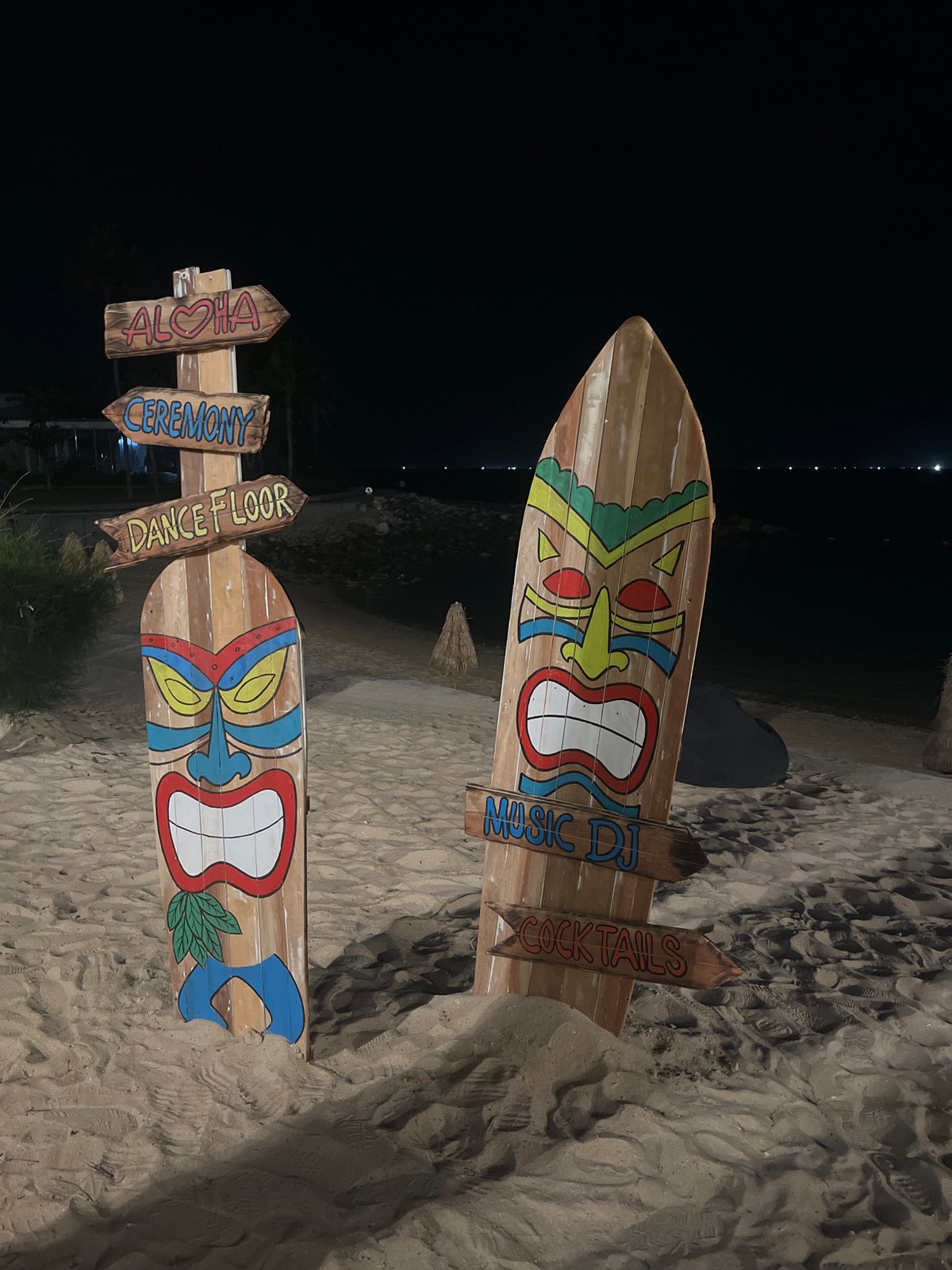 Nha Trang beach resort strip at night, sculptures and all