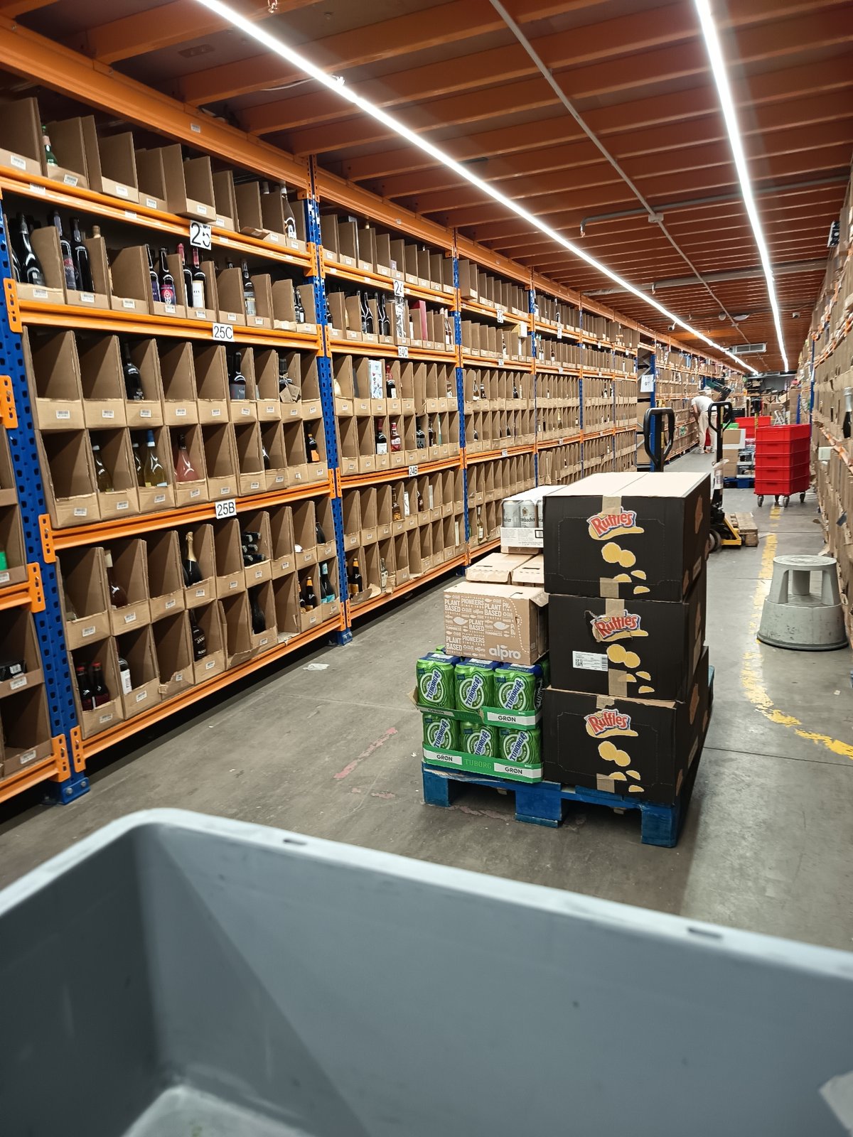 Warehouse interior with orange shelving documented in Sofia