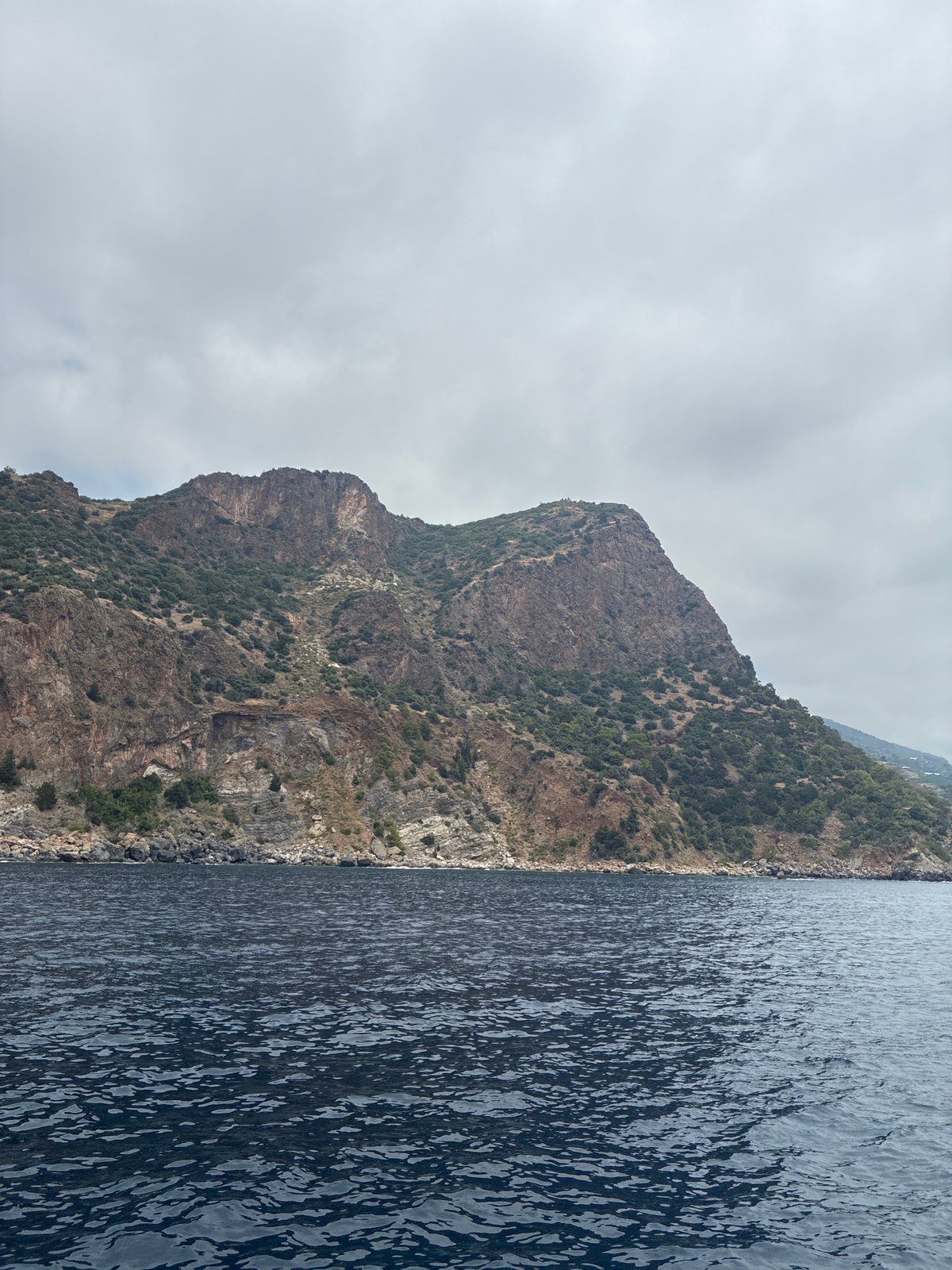 Coastal cruise past rugged cliffs and rocky islands near Gazipaşa