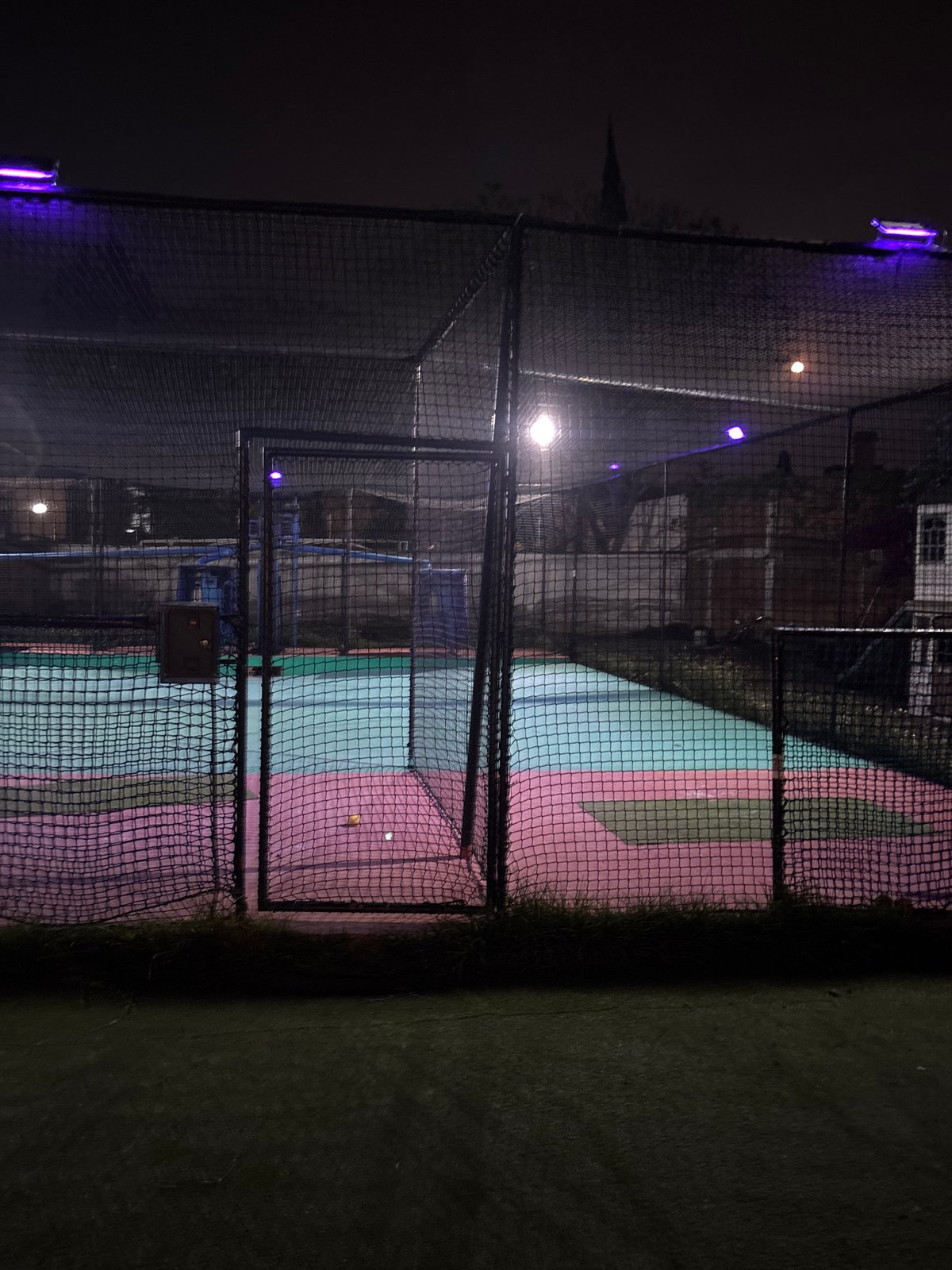 Nighttime batting cage facility documented in San Andrés Cholula