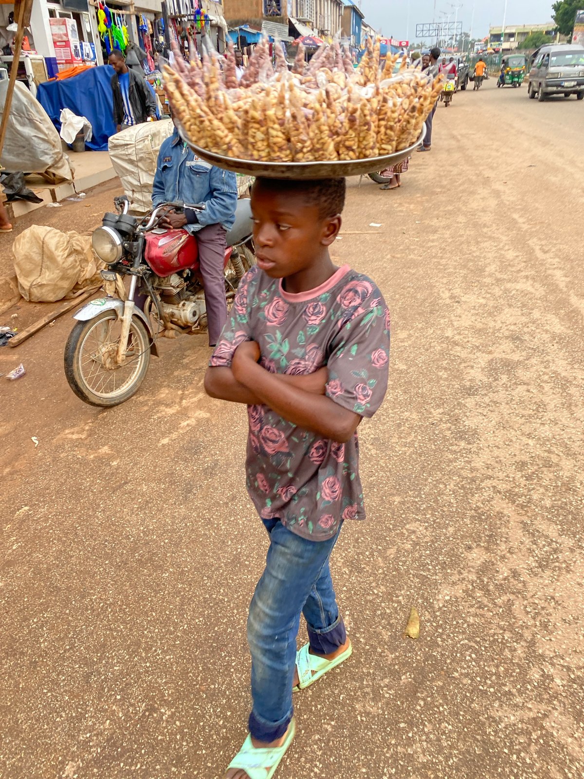 Daily street life and commerce in Bukuru, Nigeria