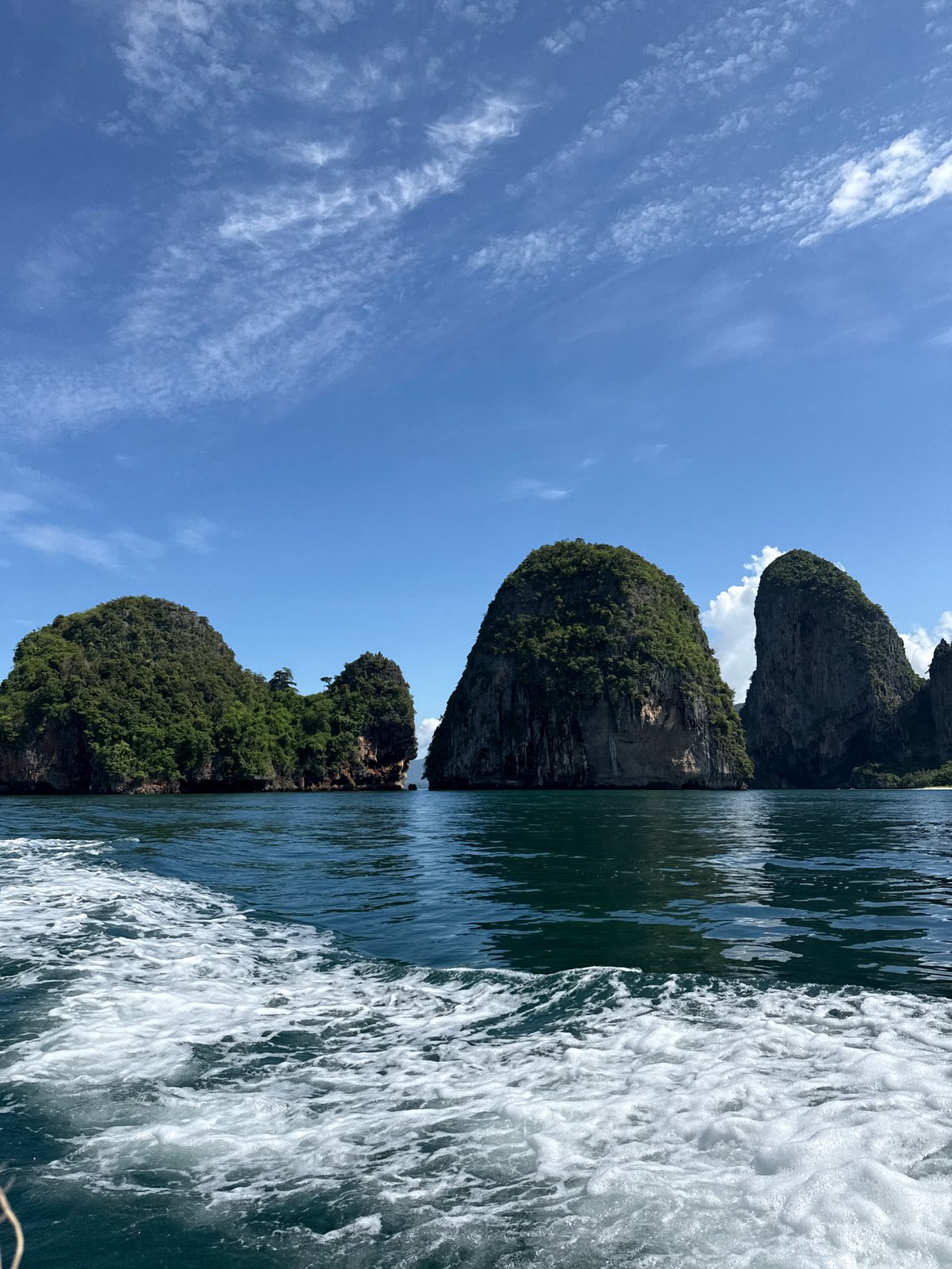 Boat journey past karst islands in Ao Nang waters