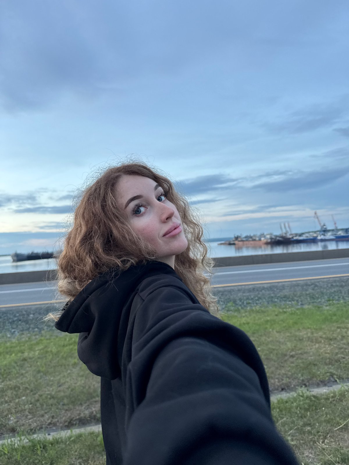 Evening in Chaikovsky: river docks, old tracks, and a Samoyed