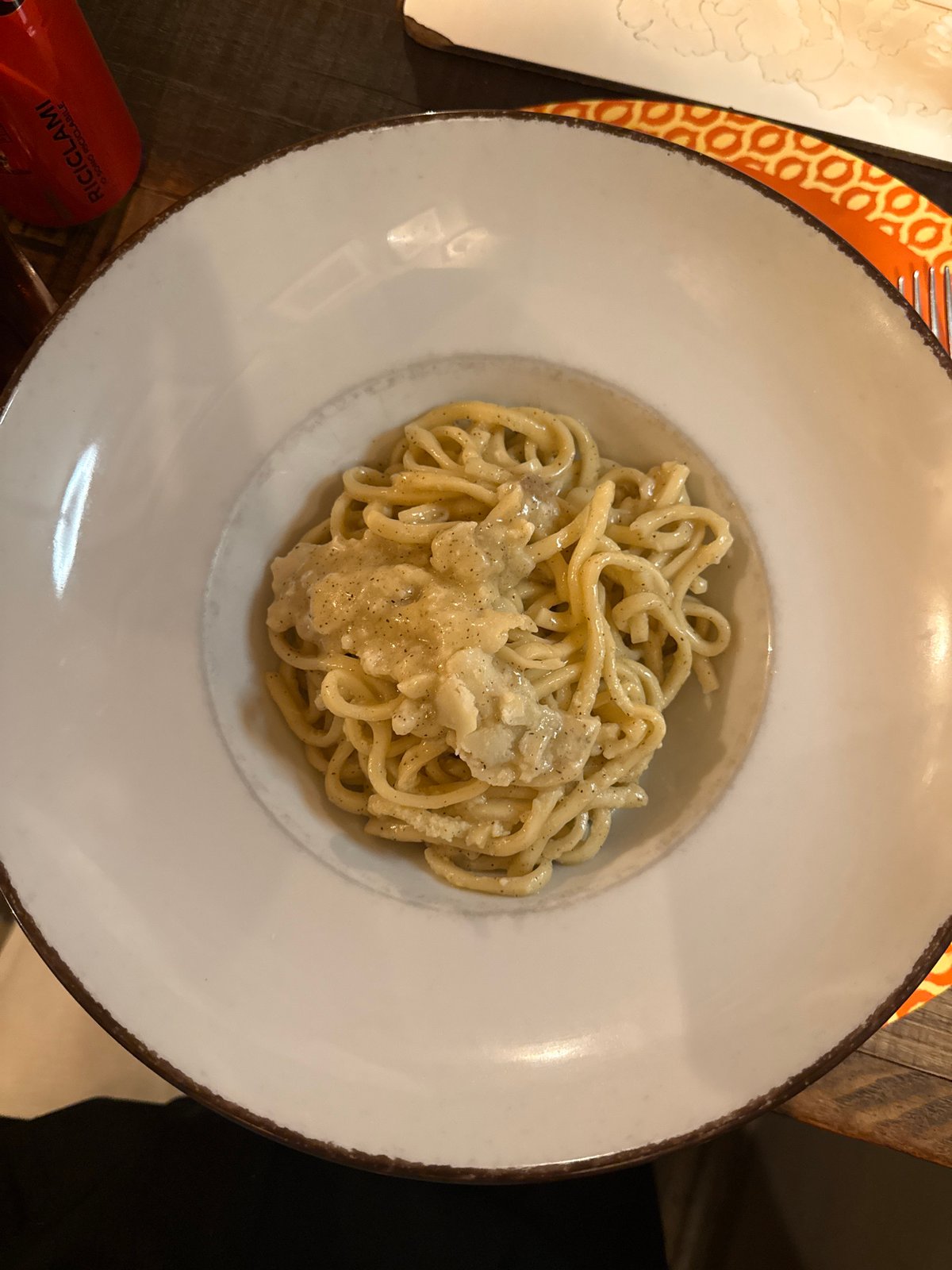 Rome diner documents pasta and dessert service from cheese wheel