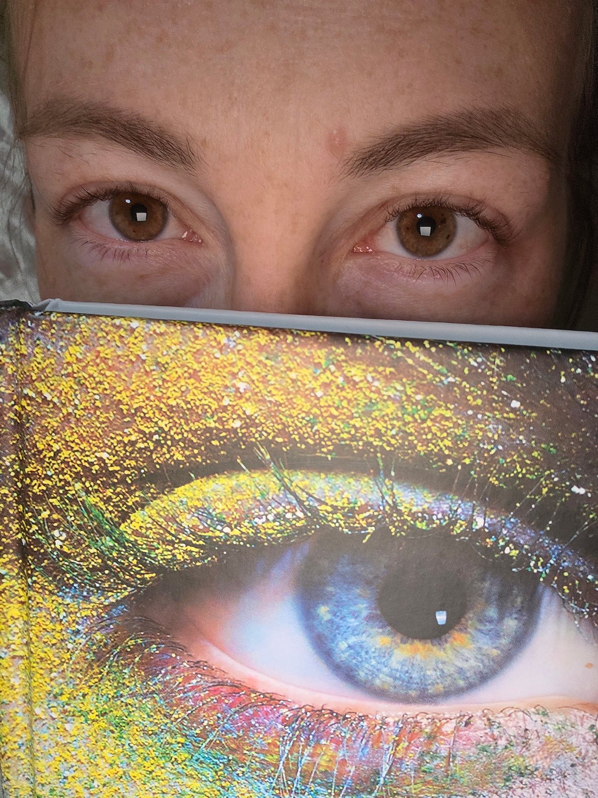 Late-night selfies and fashion magazine browsing at home in Chaikovsky