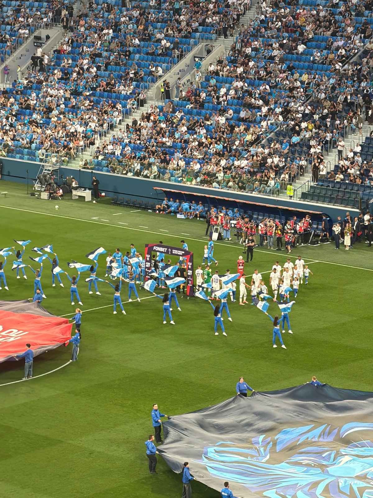 Packed stadium, blue and white fans deep into matchday