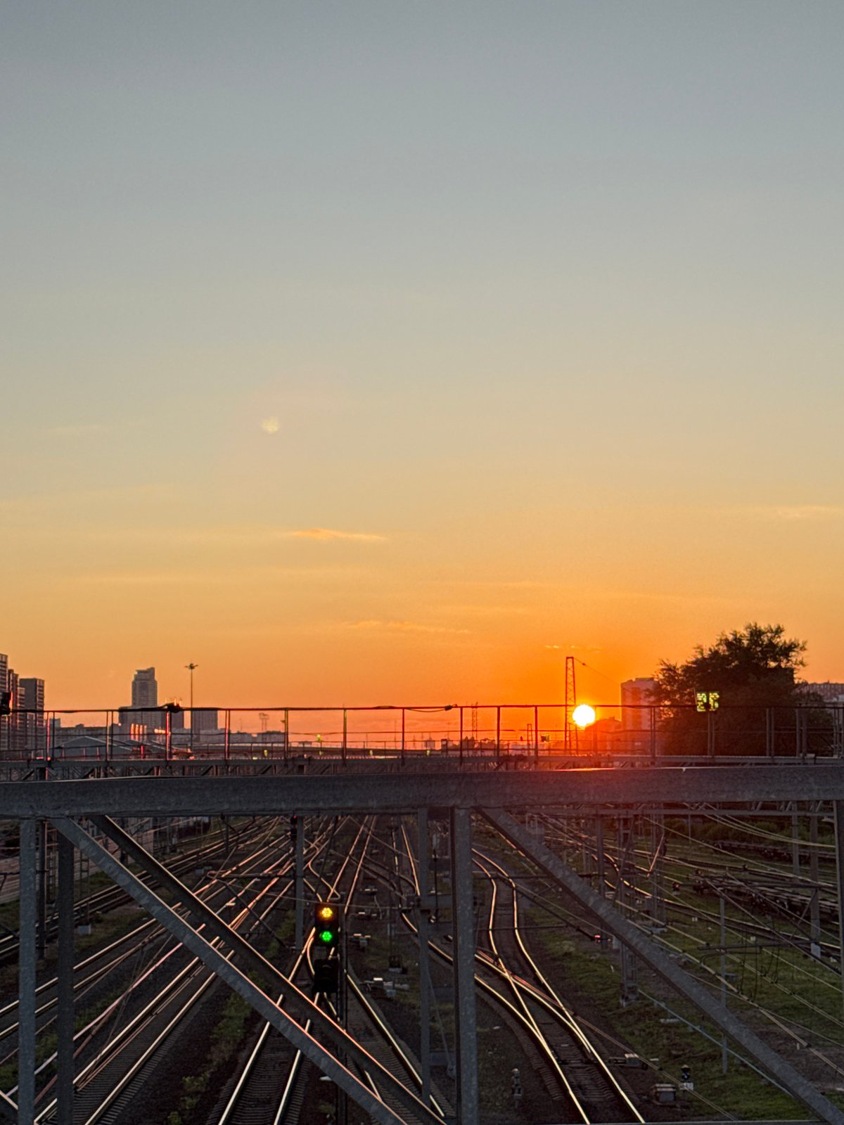 Moscow's D3 commuter train caught from ground and air at sunset