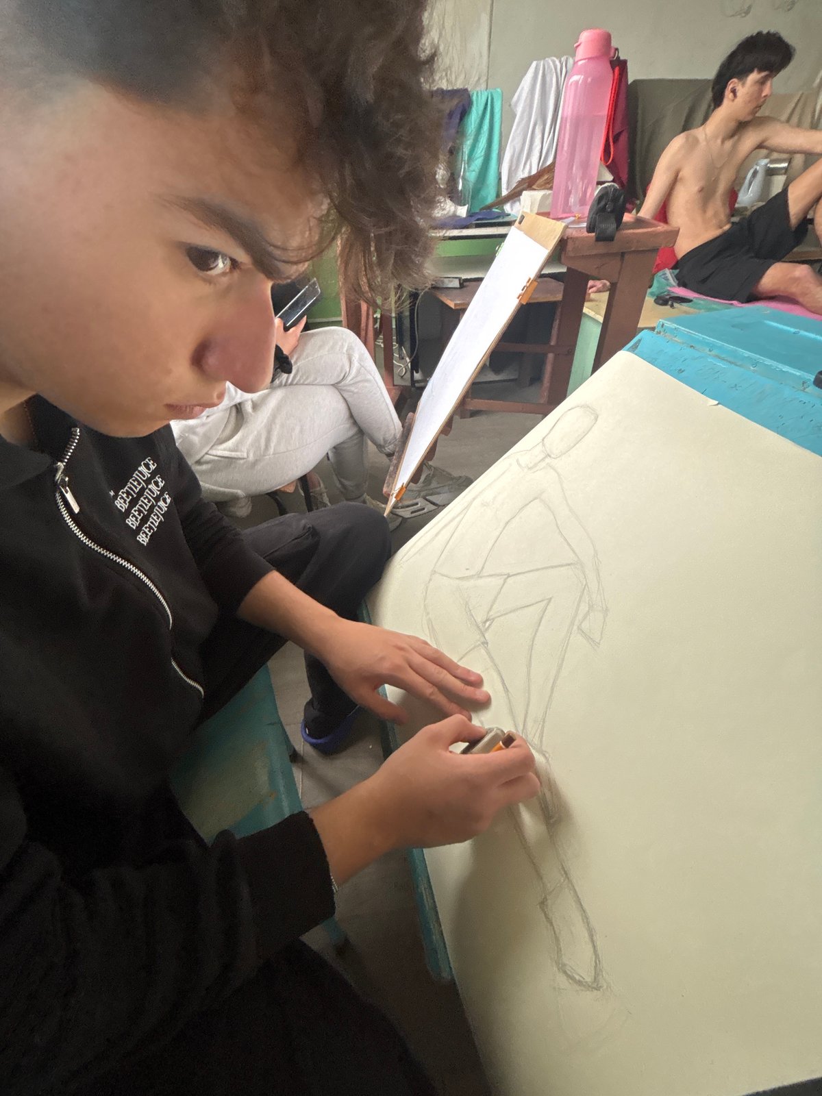 Art students sketch during morning session in Troyan studio