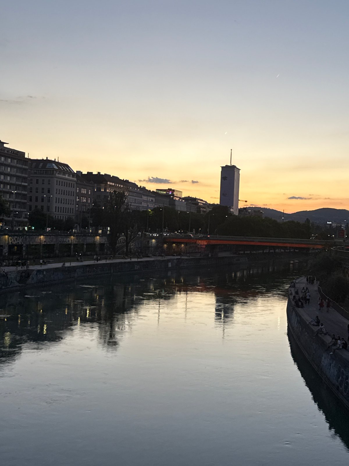 Dusk along the Danube Canal and Vienna's city streets