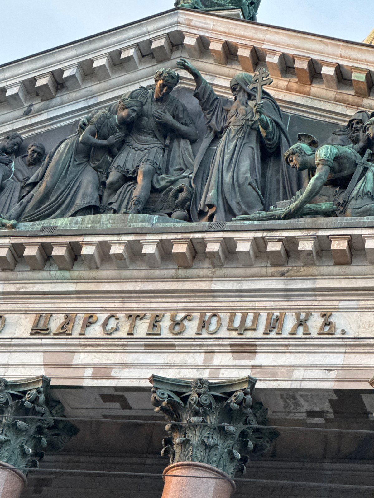 Tourist documents St. Isaac's Cathedral facades and surroundings