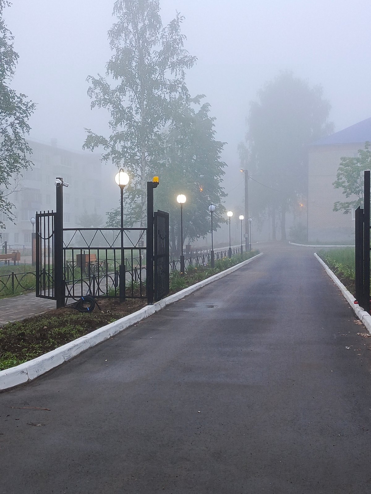 Early morning fog blankets Chaikovsky as witness documents quiet city