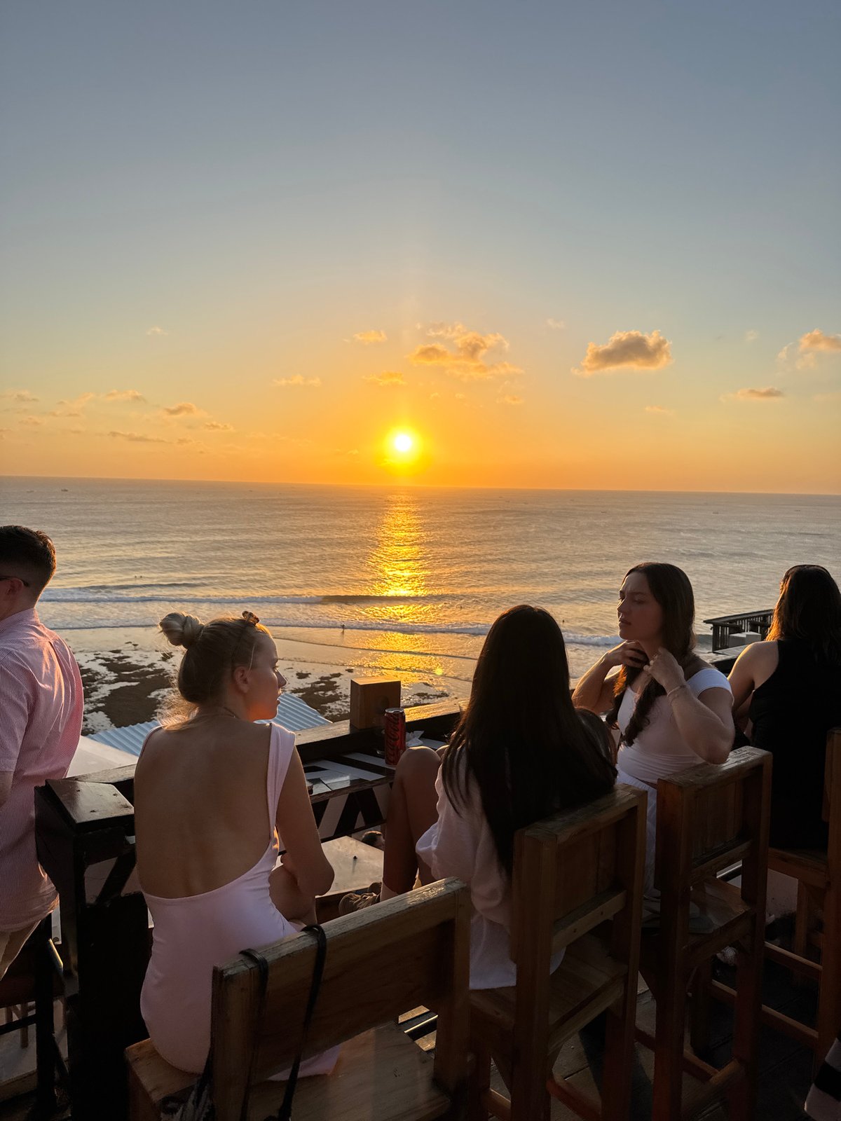 Sunset crowd at Single Fin's clifftop pool bar, Kuta Selatan