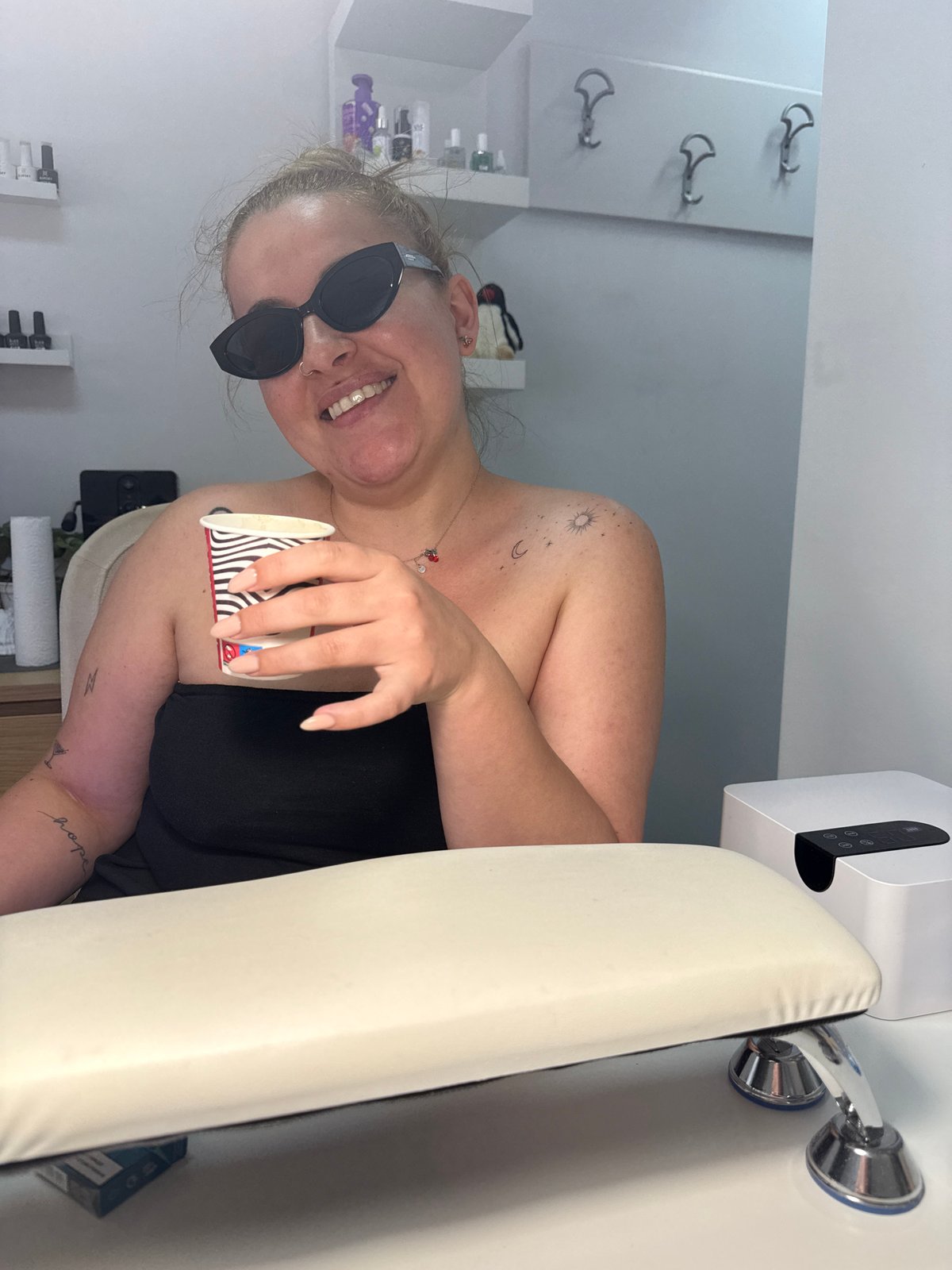 Ordinary morning moments captured in Burgas nail salon, woman with dog
