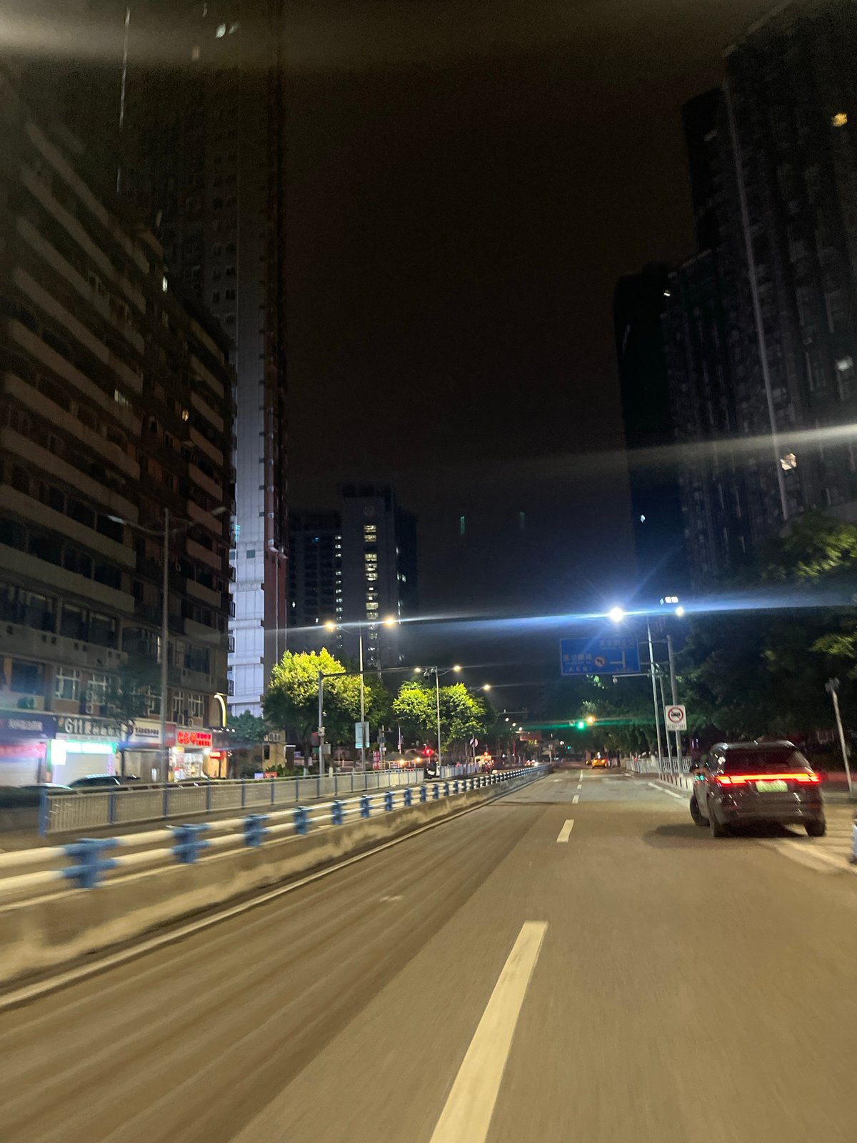 Evening street life documented across two China districts