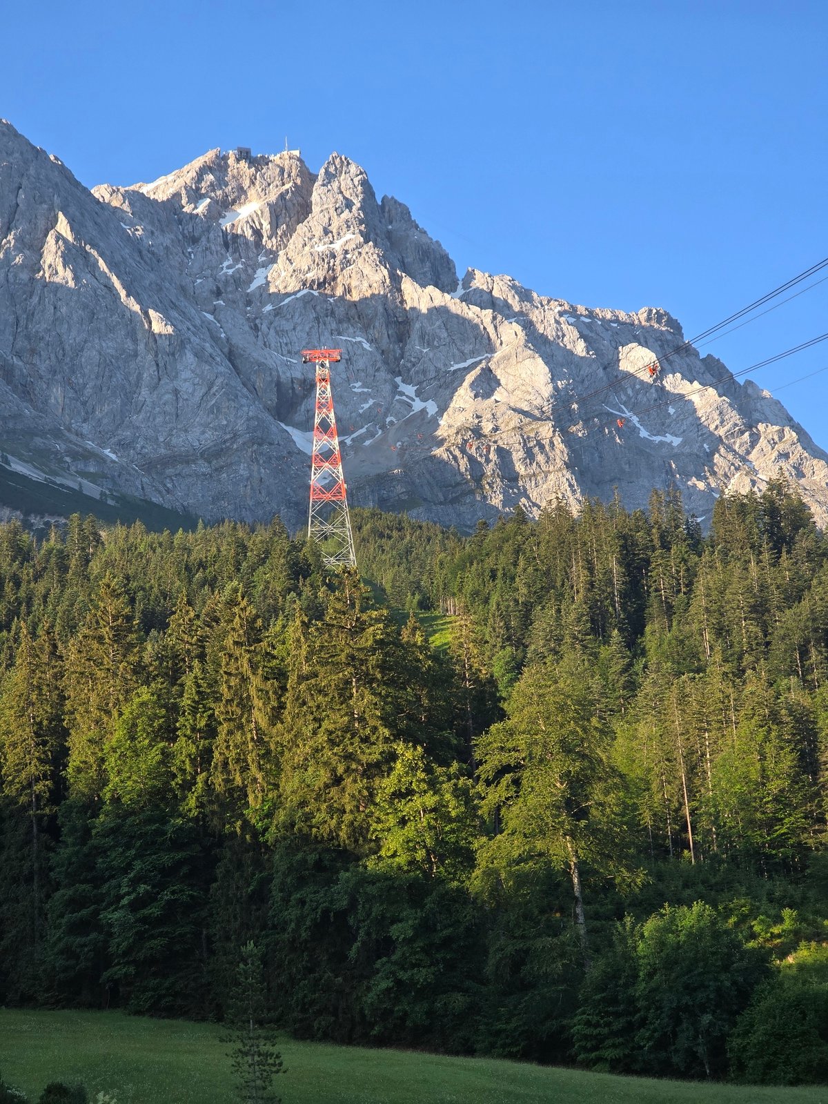 At the Zugspitze cable car base on a clear summer morning