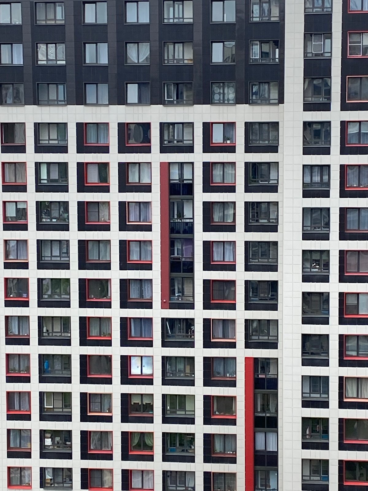 Modern building complex with playground facilities documented by witness