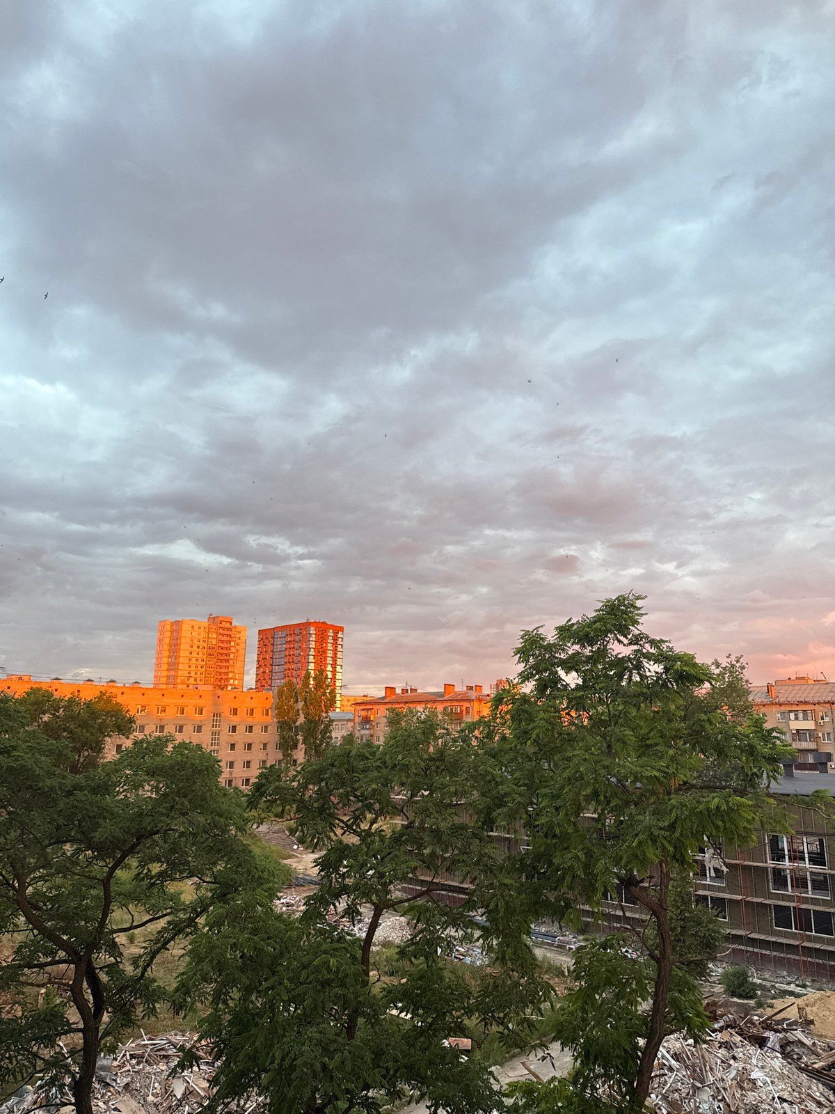 Volgograd sunset over apartment blocks, with a few random extras