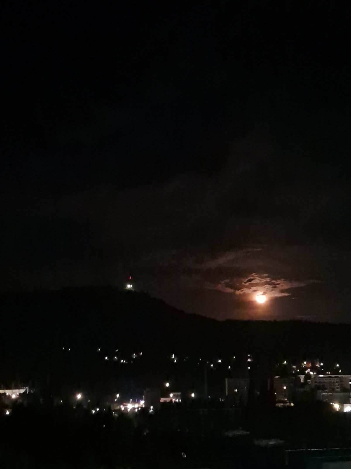 Bright moon observed over water in Gabrovo, Bulgaria