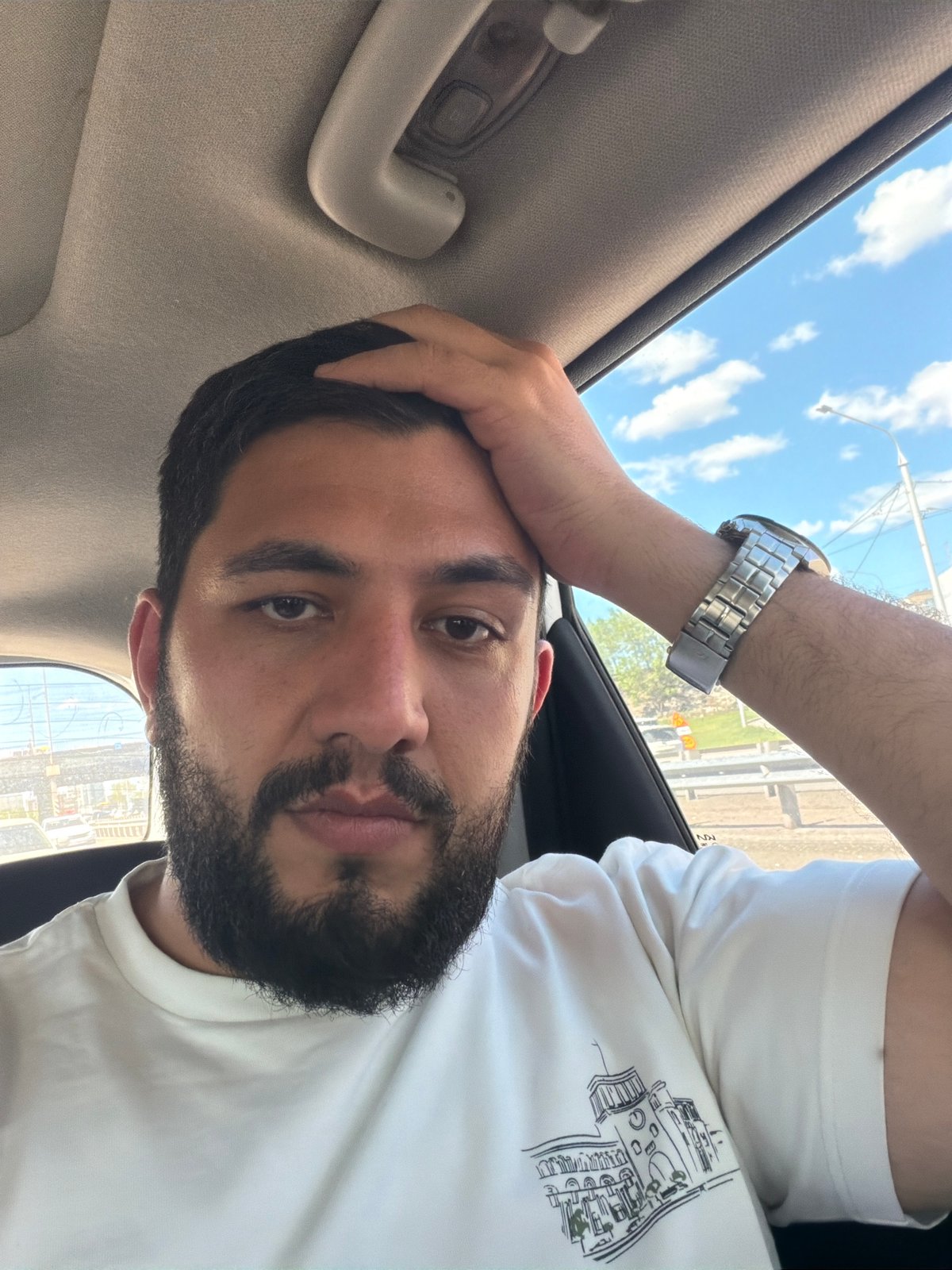 Bearded driver observed in vehicle in Krasnoyarsk, Russia