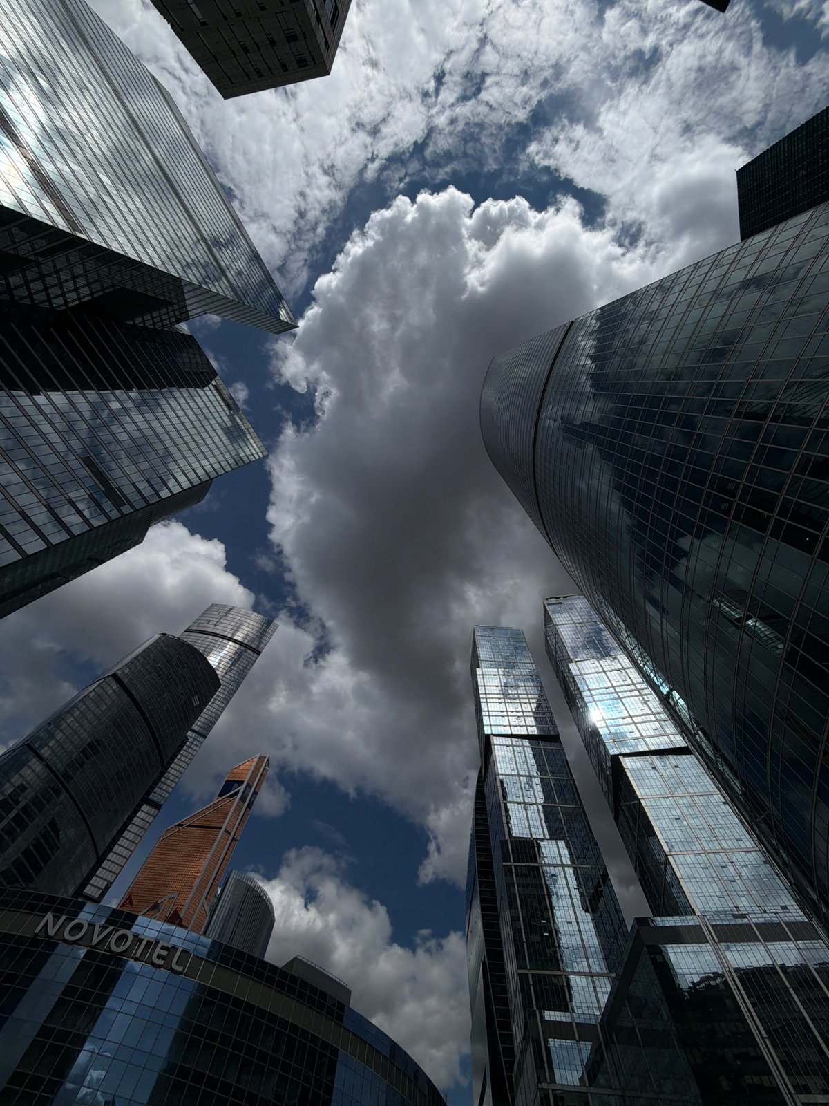 Glass skyscrapers photographed from below in Khimki, Russia