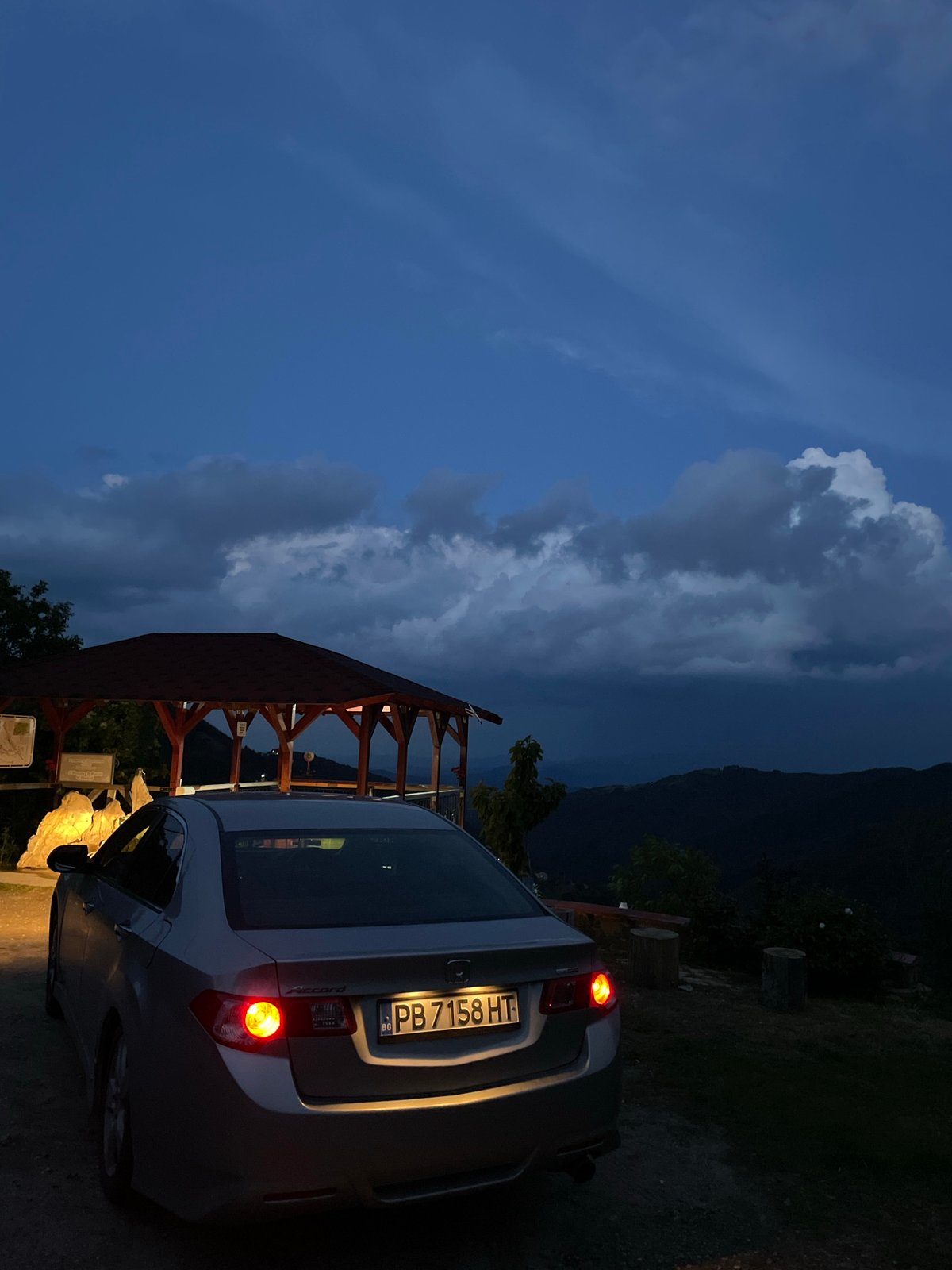 Evening life captured at Bulgarian mountain gazebo overlook