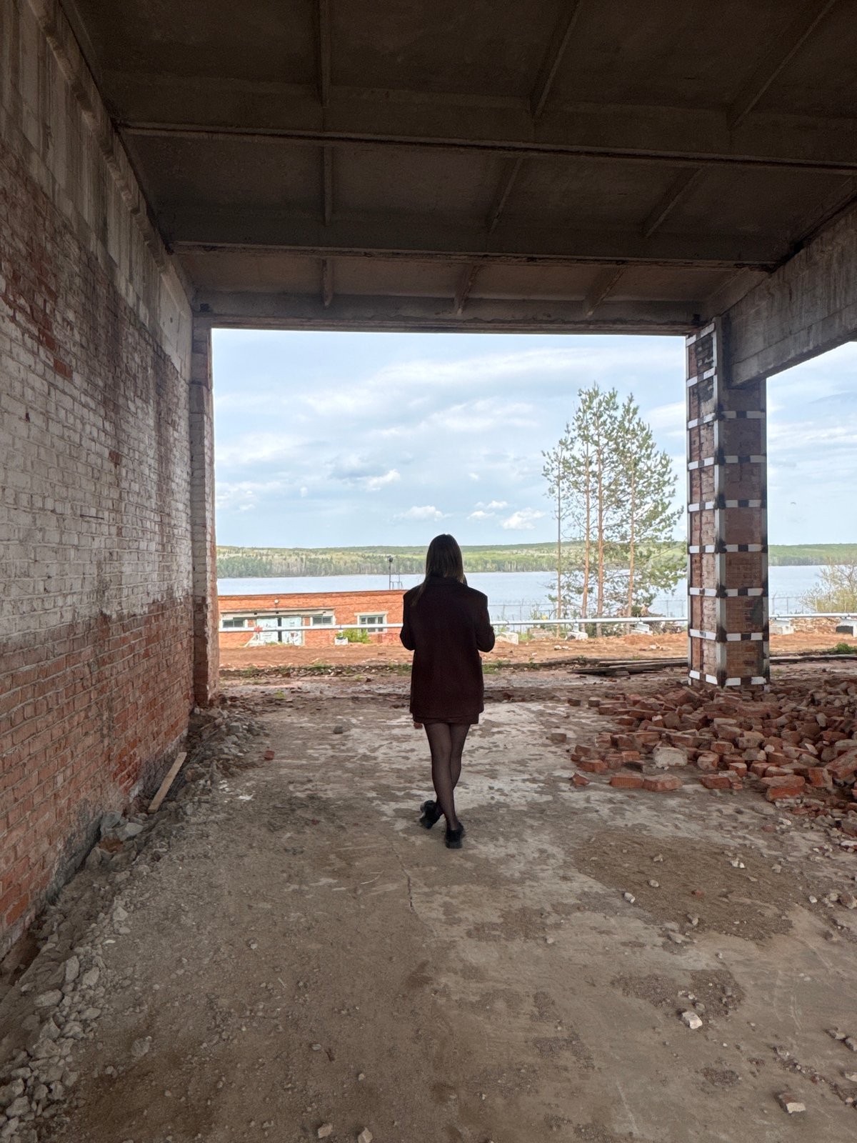 Woman Takes Selfies at Abandoned Building Site in Chaikovsky