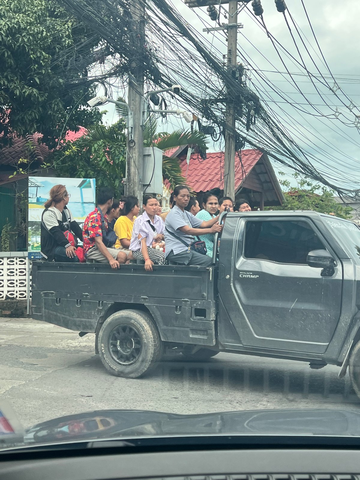Morning street life documented in Ban Bang Rak, Thailand