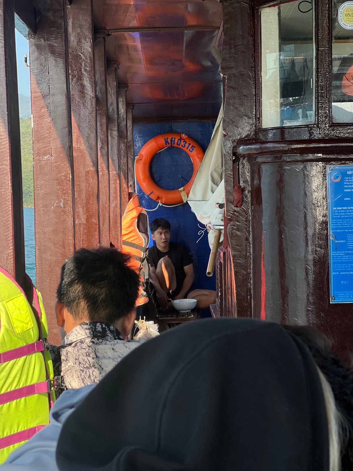 Person spotted on boat deck in Nam Nha Trang Ward
