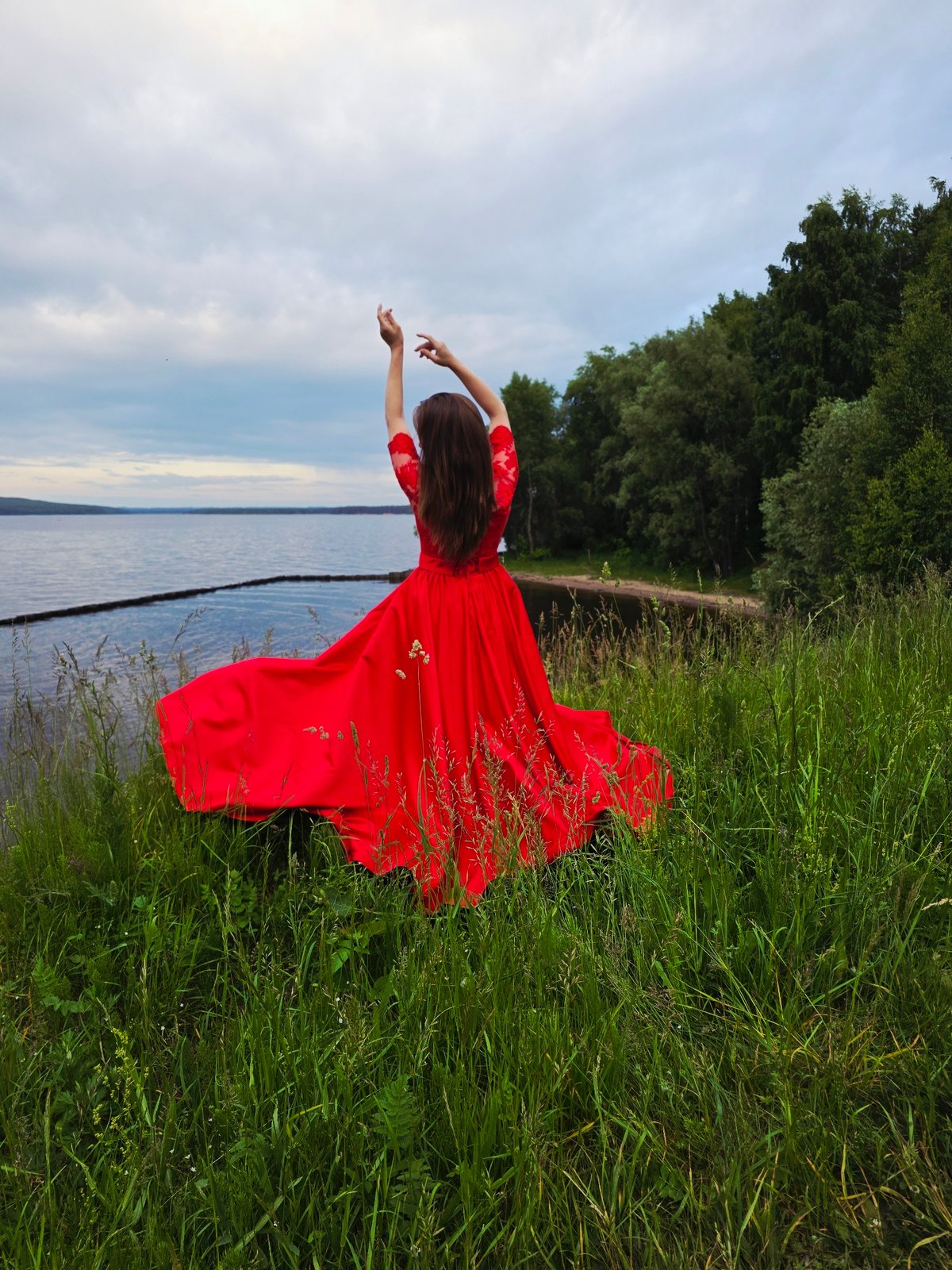 Woman with peonies explores Chaikovsky, Russia during afternoon outing