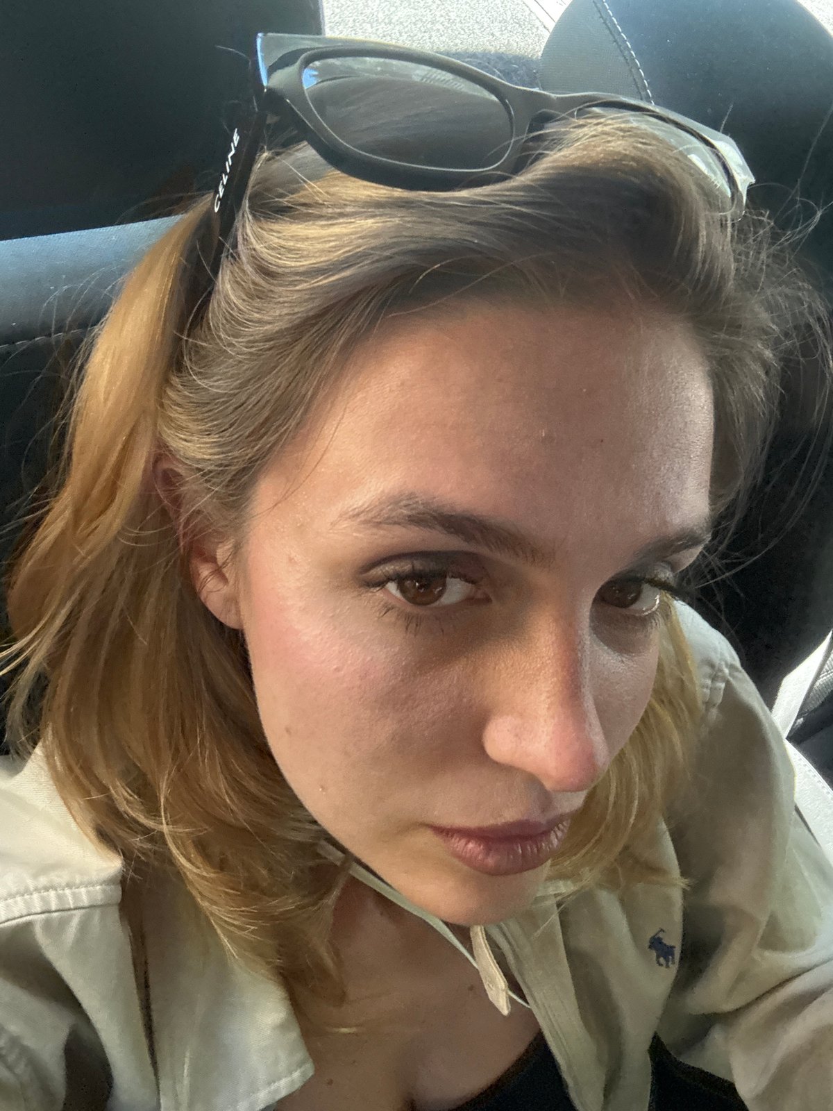 Back-seat portraits moving through Tbilisi on a July afternoon
