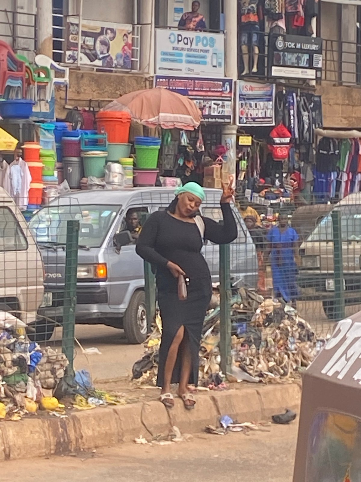 Afternoon street life and market activity in Bukuru, Nigeria