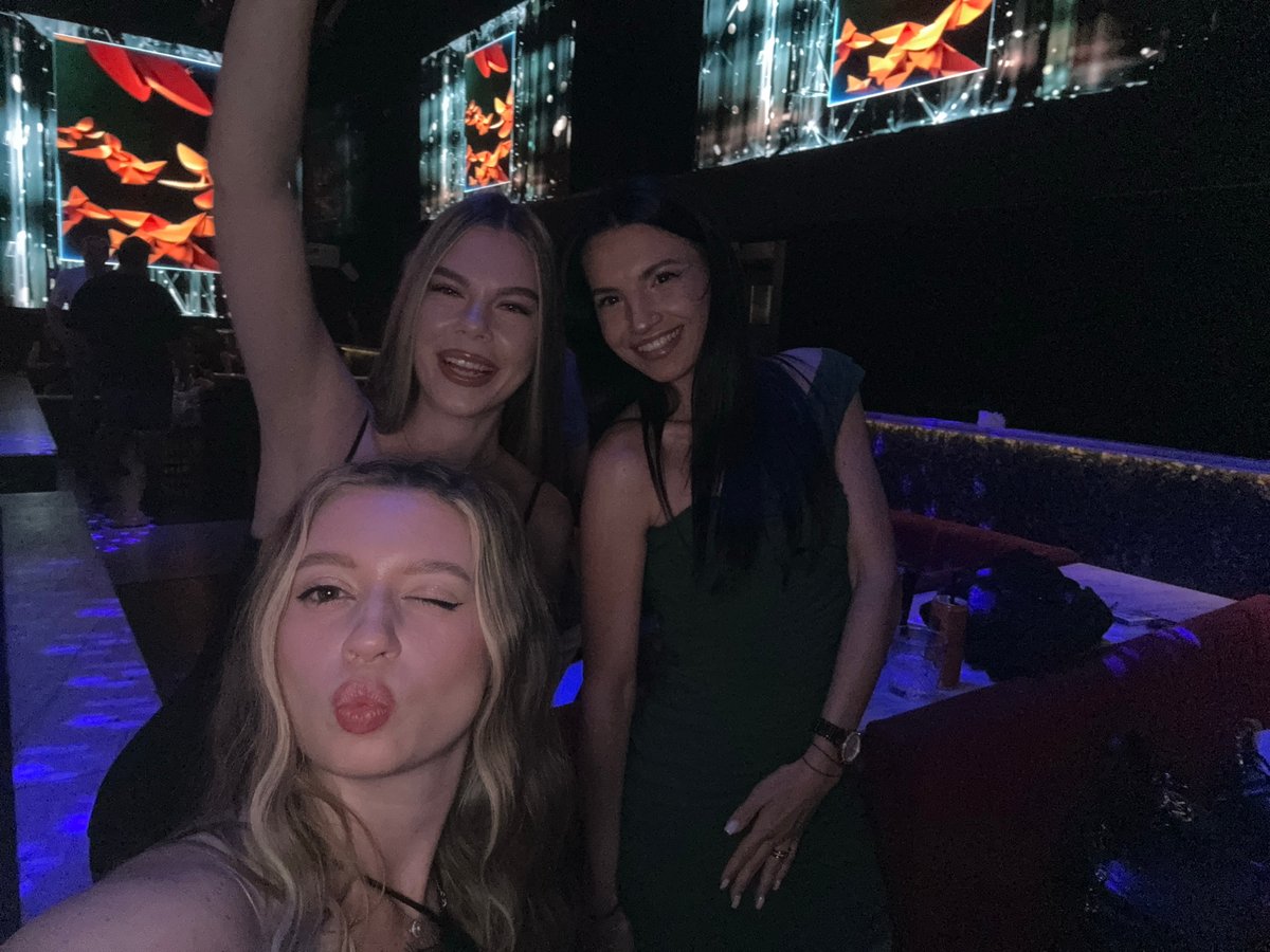 Night out at a Plovdiv club with glowing screens and selfies